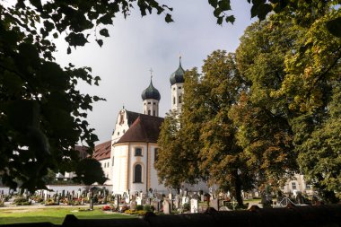 Monastery Benediktbeuren, Bavaria, Germany at Way of St. James Isar Loisach Tiroler Ache Inn in summertime clipart