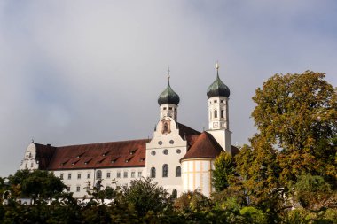 Monastery Benediktbeuren, Bavaria, Germany at Way of St. James Isar Loisach Tiroler Ache Inn in summertime clipart