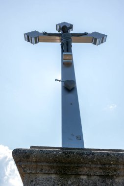 Summit cross of Bodenschneid mountain, Bavaria, Germany,  in springtime clipart