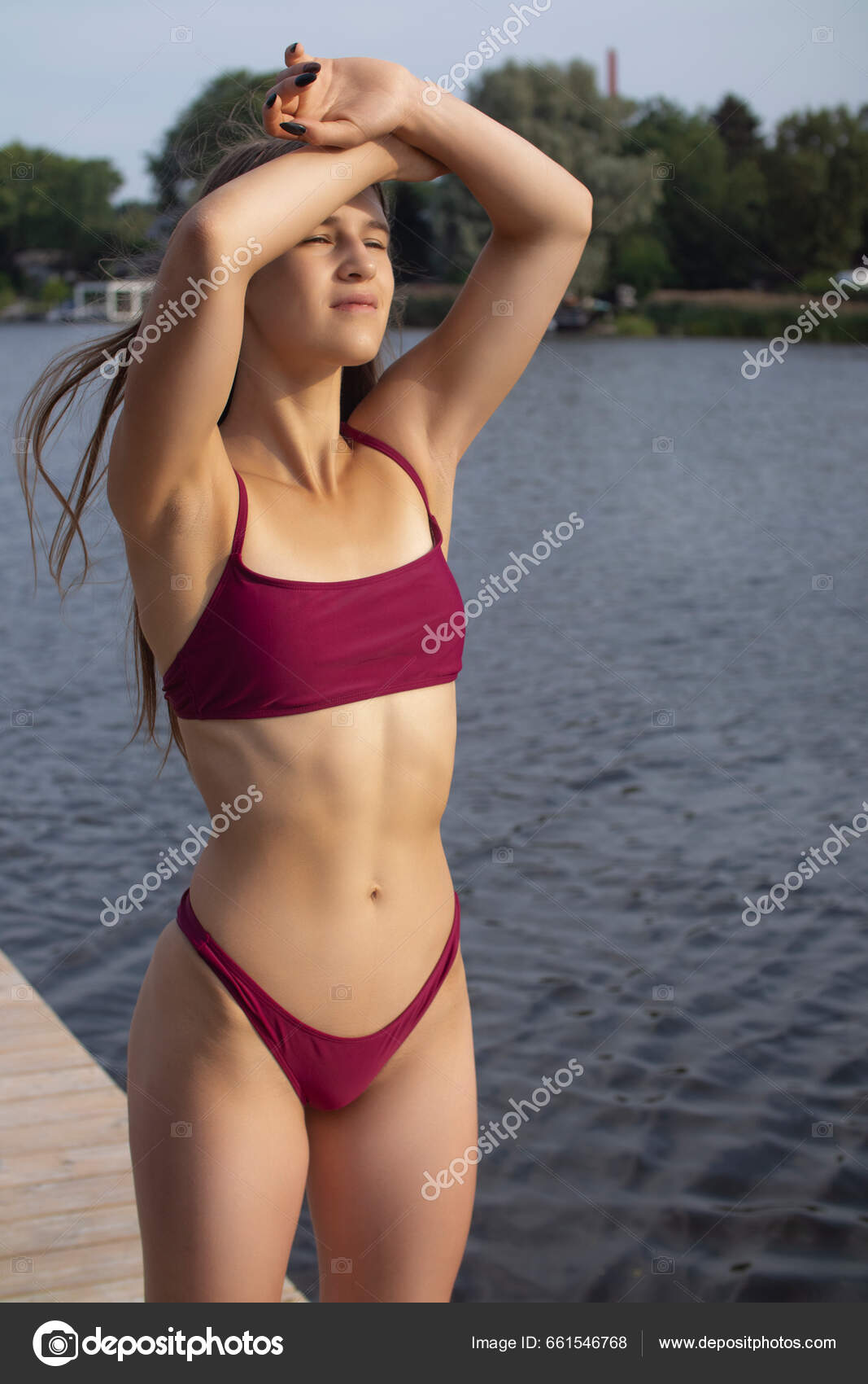 Young Woman Red Bikini Pool Stock Photo by ©zhagunov 661546768