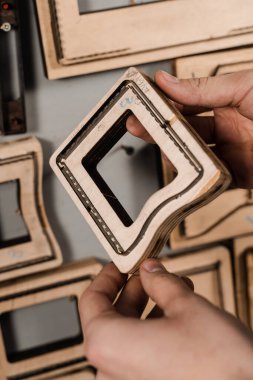 Forms for leather punching press for punch genuine leather. Craftsman tools. Process of creating genuine leather products in factory