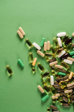 Mix of dietary biologically active supplement tablets for healthy diet for every day. Set of mulvitamin, amino acids, minerals and magnesium antistress, melatonin close-up