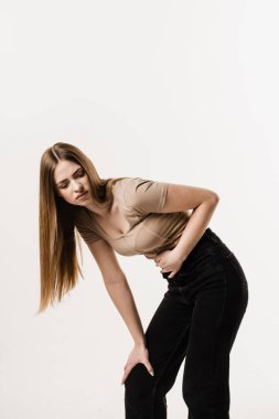 Menstruation and pain during menstruation of girl. Violation of menstrual cycle in young woman. Algo dysmenorrhea