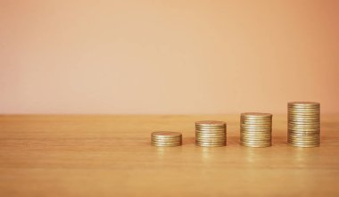 coins on a wooden background. money concept.