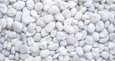 Çakıl taşlarının arka planı. doğal taşın dokusu. 