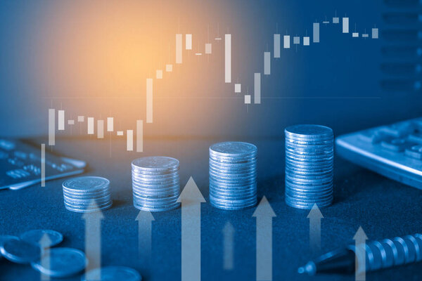 stacks of coins and financial charts, business and finance concept
