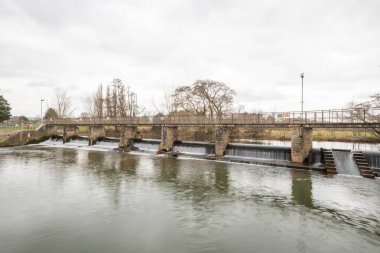 The river Tone flowing through French Weir in Taunton in Somerset