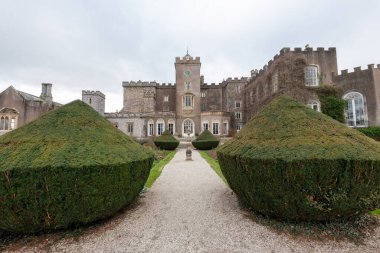 Kenton.Devon.United Kingdom.February 17th 2023.Photo of the east front of Powderham castle in Devon clipart