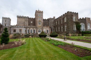 Kenton.Devon.United Kingdom.February 17th 2023.Photo of the east front of Powderham castle in Devon clipart