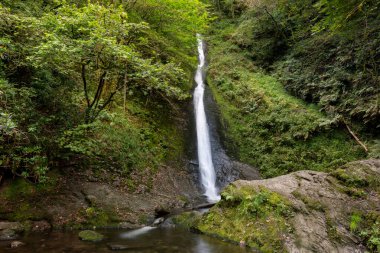 Long exposure of the White Lady waterfall on the river Lyd at Lyford Gorge in Devon