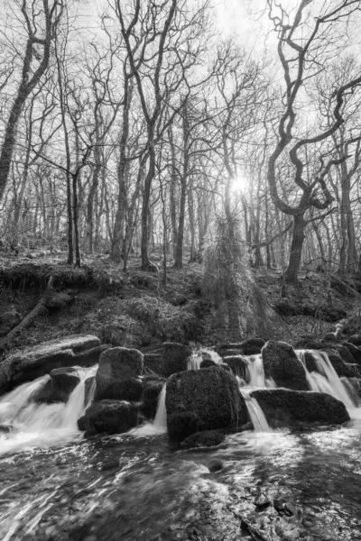 Stock image Long exposure of a waterfall on the Hoar Oak Water river at Watersmeet in Exmoor National Park