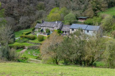 Tarr Steps.Somerset.United Kingdom.April 28th 2024.Photo of the Tarr Farm Inn at Tarr Steps in Exmoor National Park clipart