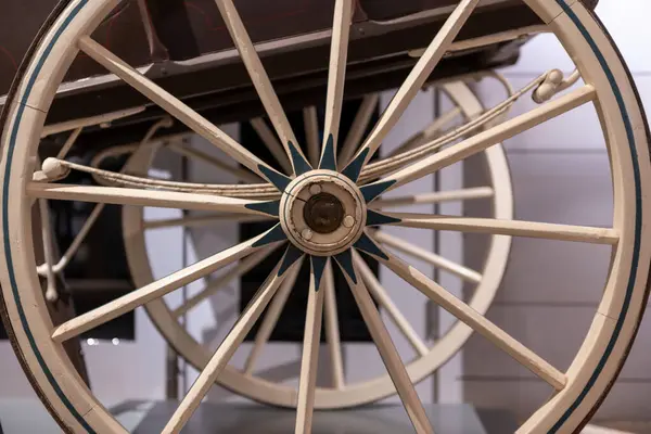 stock image Close up of a wooden cart wheel on an antique horse drawn cart