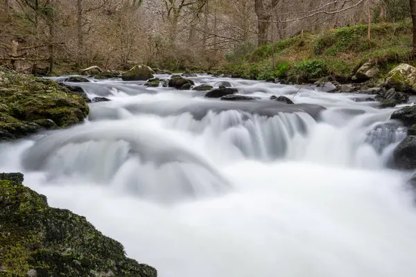 stock image Long exposure of a waterfall on the East Lyn river at Watersmeet In Exmoor National Park