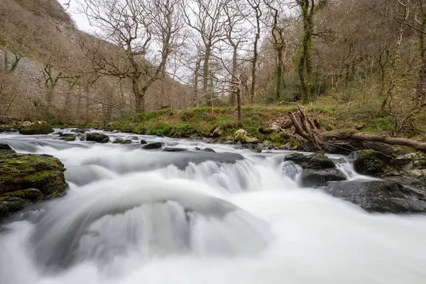 stock image Long exposure of a waterfall on the East Lyn river at Watersmeet In Exmoor National Park