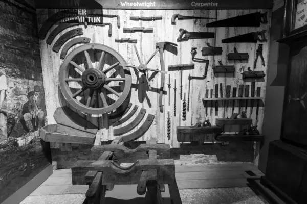 stock image Glastonbury.Somerset.United Kingdom.December 30th 2023.A selection of antique tools used by a wheelwright and a carpenter are on show at the Somerset Rural Life Museum