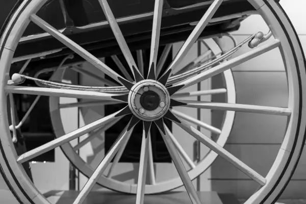 stock image Close up of a wooden cart wheel on an antique horse drawn cart