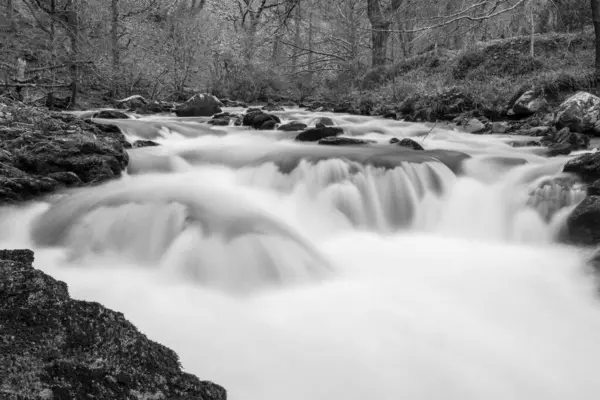 stock image Long exposure of a waterfall on the East Lyn river at Watersmeet In Exmoor National Park