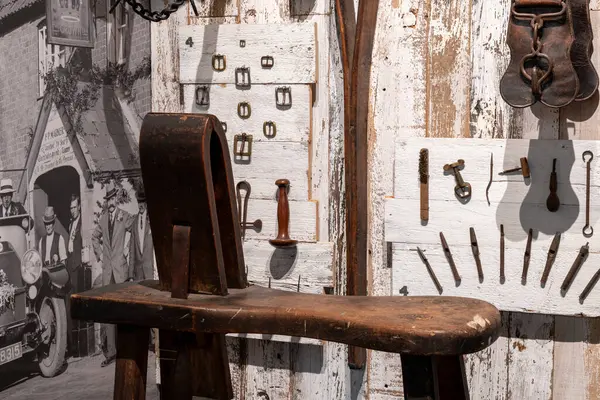 stock image Glastonbury.Somerset.United Kingdom.March 24th 2024.An antique saddlers stool from around 1900 is on show at the Somerset Rural Life Museum