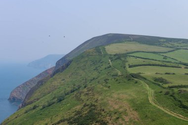 Landscape photo of Great Hangman on the South West coast path clipart