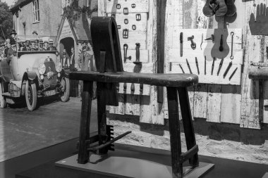 Glastonbury.Somerset.United Kingdom.March 24th 2024.An antique saddlers stool from around 1900 is on show at the Somerset Rural Life Museum clipart