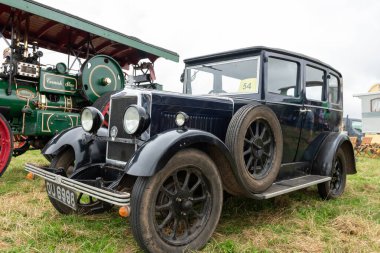 Low Ham.Somerset.Birleşik Krallık. 20 Temmuz 2024 1930 'dan Morris Cowley, Somerset Steam and Country Show' da sergileniyor.