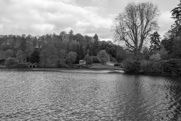 stock image Black and white photo of the lake at Stourhead gardens in Wiltshire