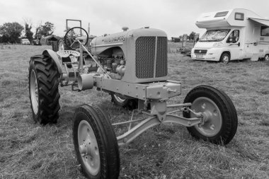 Low Ham.Somerset.United Kingdom.July 20th 2024.A restored vintage Allis Chalmers tractor is on show at the Somerset Steam and Country Show clipart