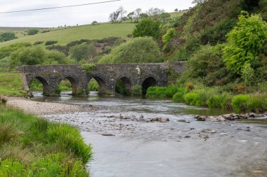 Photo of the river Barle flowing under Landacre bridge in Exmoor National Park clipart