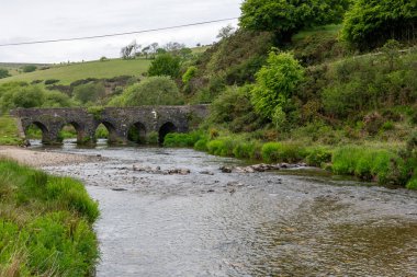 Photo of the river Barle flowing under Landacre bridge in Exmoor National Park clipart