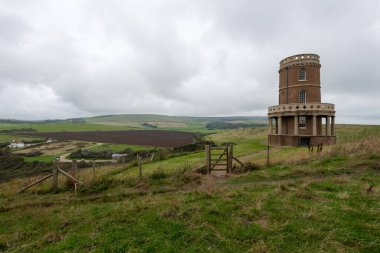 Clavell Tower overlooking Kimmeridge Bay in Dorset clipart