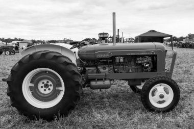 Haselbury Plucknet.Somerset.United Kingdom.August 17th 2024.A modified green Fordson Major is on show at a Yesterdays Farming event clipart