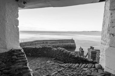 Clovelly. Devon. Birleşik Krallık. 19 Ocak 2024. Clovelly, Kuzey Devon sahilindeki rıhtımın fotoğrafı.