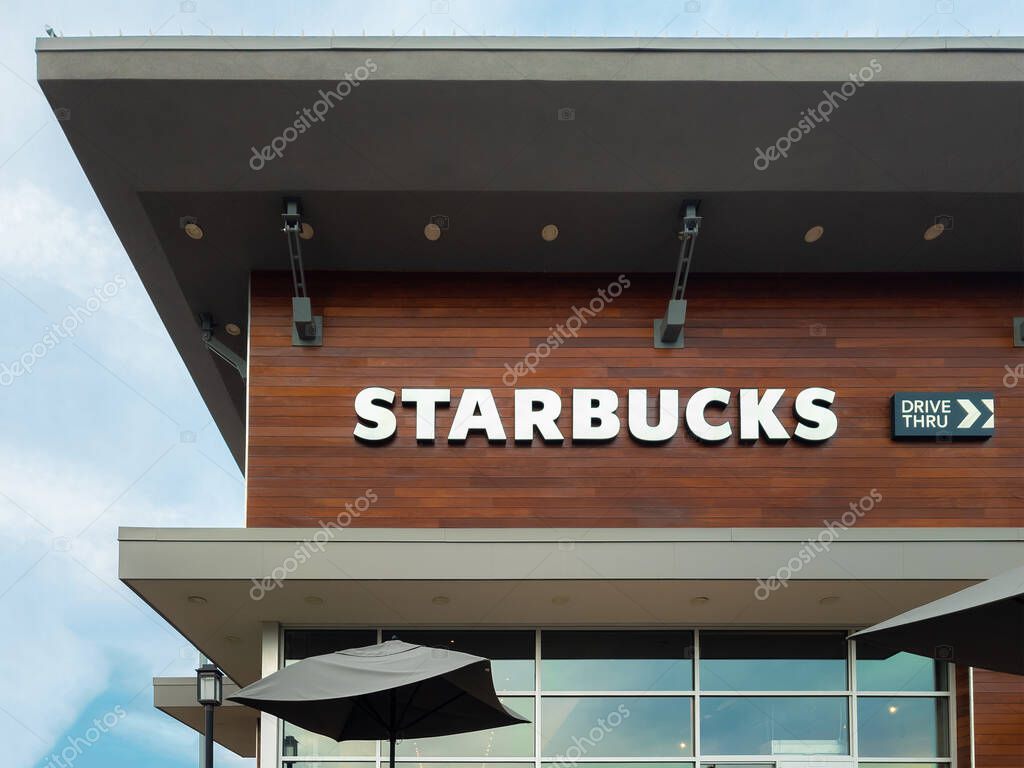 New Hartford, New York - Oct 3, 2022: Closeup View of Starbucks Storefront Logo.