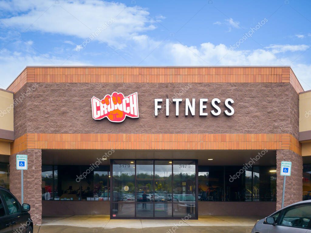 Syracuse, New York - Apr 29, 2023: Landscape Close-up View of Crunch Fitness Building Exterior.