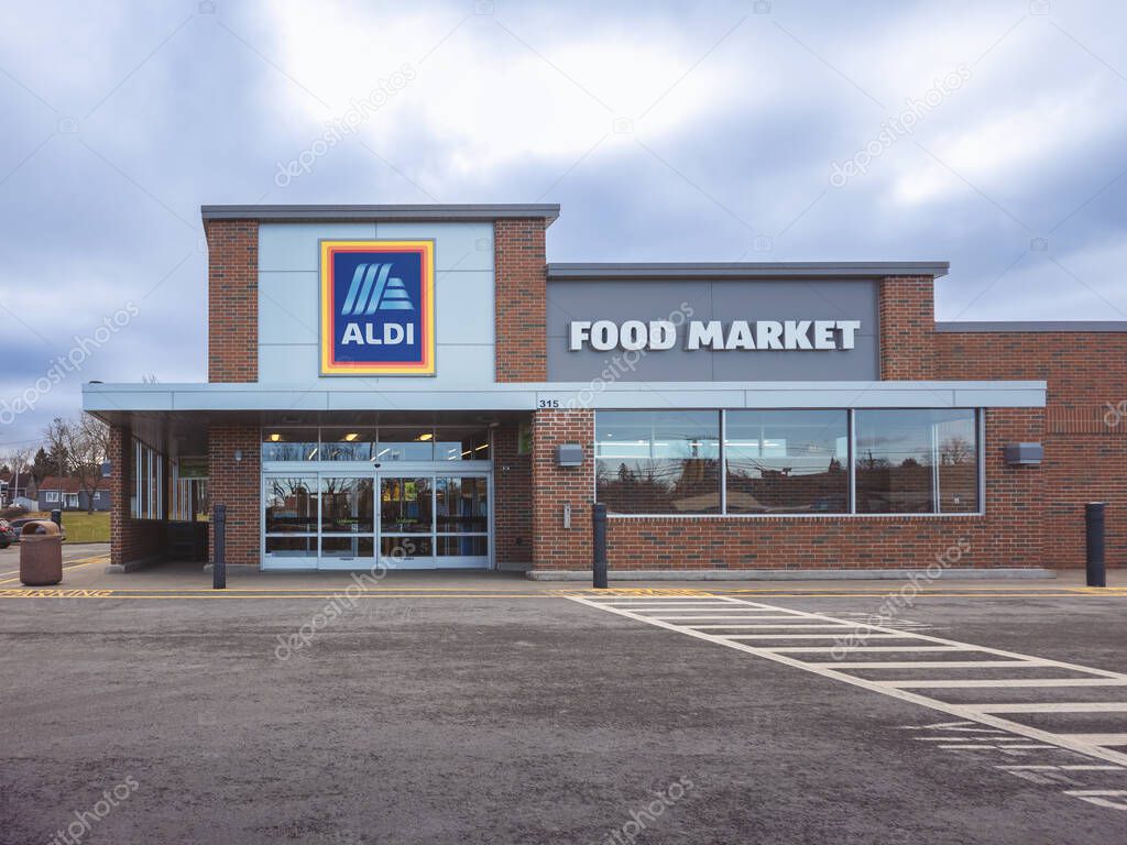 Yorkville, New York - Jan 4, 2024: Close-up Night View of Aldi Market which stands for Albrecht Discount. ALDI is a Global Discount Supermarket Chain that Originated in Germany.