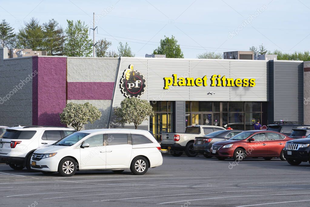 Utica, New York - Sep 10, 2024: Close-up View of Planet Fitness Gym and Workout Center, Planet Fitness identifies itself as a Judgment Free Zone.
