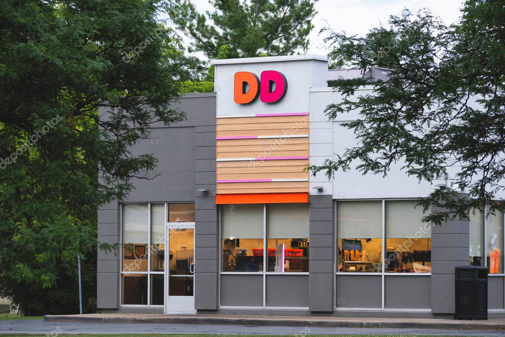 Utica, NY - Jul 9, 2025: view of Dunkin' Donuts is an American coffee and doughnut Co., and quick service restaurant with 12,000 locations in 36 countries, serving more than 3 million customers daily