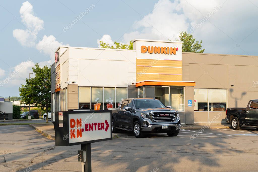 Utica, NY - Jul 14, 2025: view of Dunkin' Donuts is an American coffee and doughnut Co., and quick service restaurant with 12,000 locations in 36 countries, serving more than 3 million customers daily
