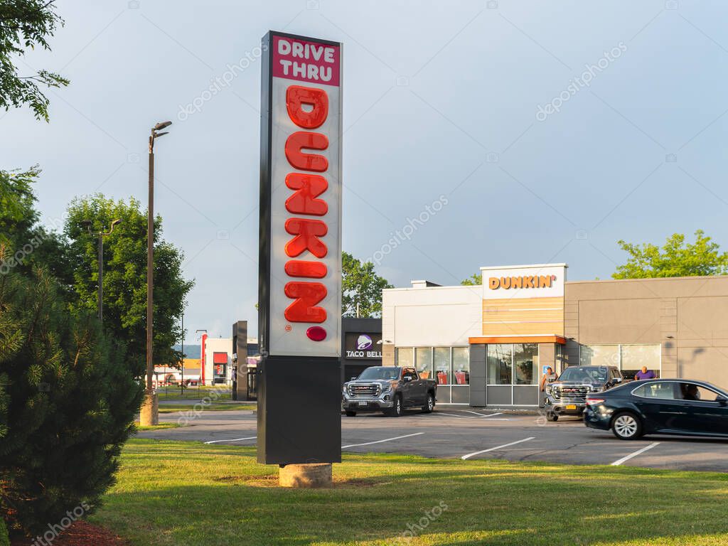 Utica, NY - Jul 14, 2025: view of Dunkin' Donuts is an American coffee and doughnut Co., and quick service restaurant with 12,000 locations in 36 countries, serving more than 3 million customers daily