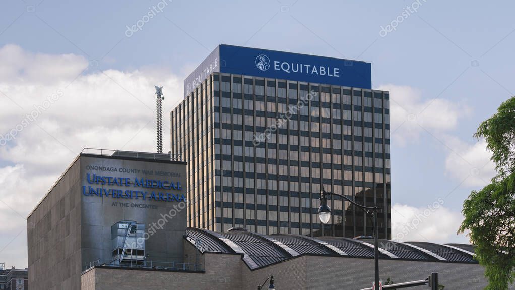 Syracuse, NY - Jul 30, 2025: Close-up of The Equitable Tower, located at 120 Madison Street in Syracuse, NY, are a prominent feature of the city's skyline, with Upstate Medical University Arena