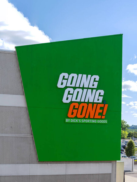 Syracuse, NY - Jul 21, 2025: Close-up of Going Going Gone Store signage by Dick's Sporting Goods, is a phrase commonly associated with baseball, referring to a home run ball soaring into the stands