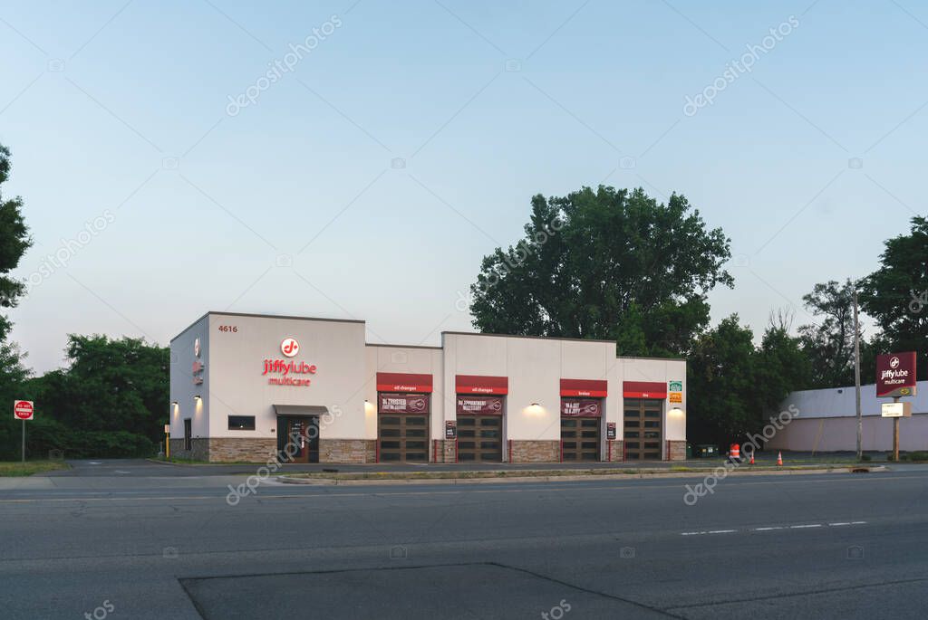 New Hartford, New York - Jul 24, 2025: Ultra-wide night view of Jiffy Lube Auto Service Center, Jiffy Lube is a nationwide chain operating as independent franchise