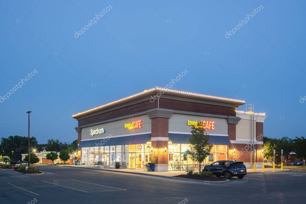 New Hartford, NY - Jul 24, 2025: Night view of Tropical Smoothie Cafe, is a popular chain of cafes specializing in smoothies, food, and beverages with over 1489 locations across the USA as of 2024