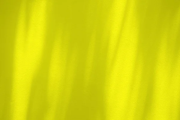 Золотая Палочка Бетонном Фоне Стены Тенью Светом — стоковое фото