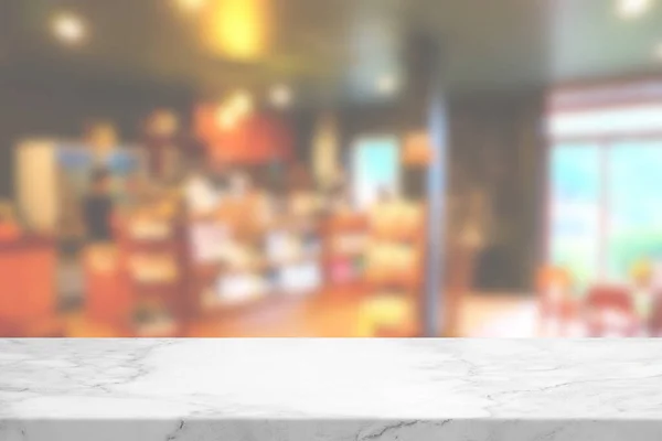 Marble Table with Blurred Cafe Interior Background, Suitable for Product Presentation Backdrop, Display, and Mock up.