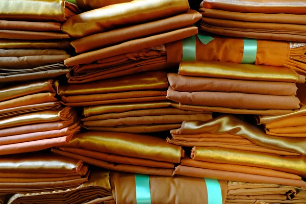 Stack of Buddhist Monk Robes.