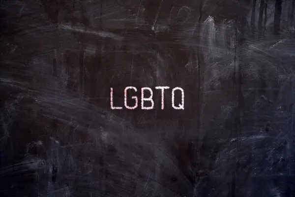 LGBTQ in Chalk Writing Style on the Blackboard.