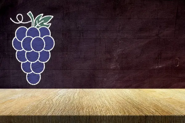 Wood Table with Grapes in Chalk Drawing Style on Grunge Chalkboard Background, Suitable for Product Presentation Backdrop, Display, and Mock up in Wine Concept.