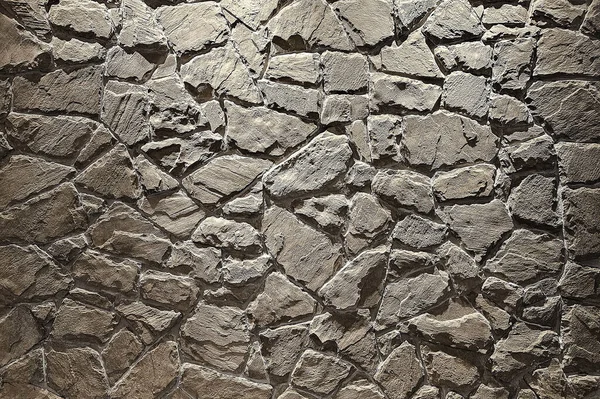 Dark Stone Wall Background with Spotlight from the Top.